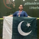 Mahnoor Ali poses with the Pakistan flag with her medal at the HEAD Danish Junior Open on September 29, 2024. — Facebook/Khyber Pakhtunkhwa Squash Association